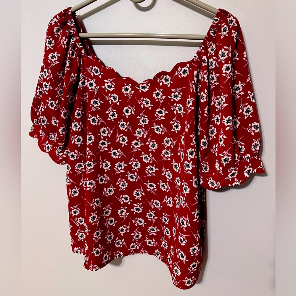 Red floral blouse